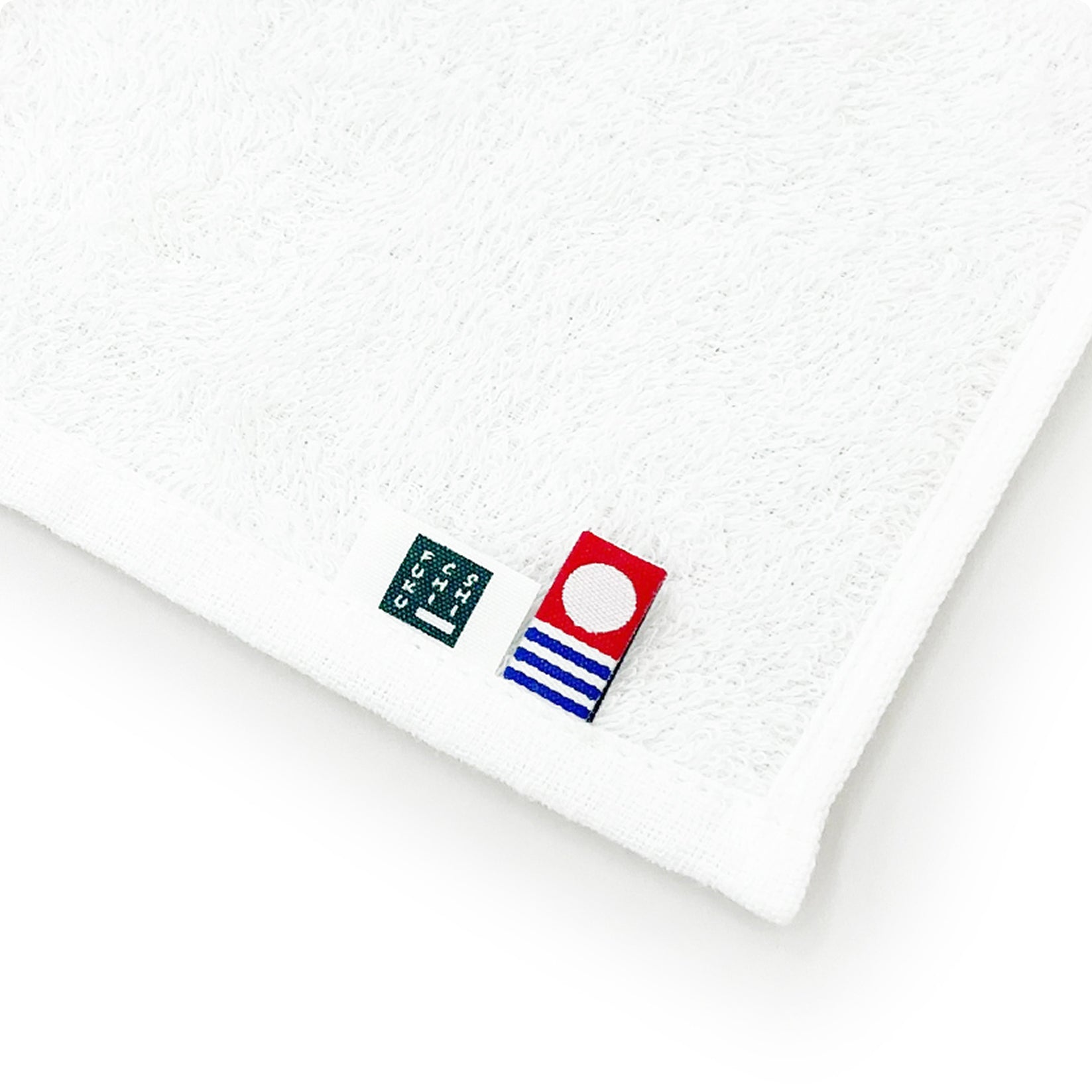 Towel with the Imabari Towel brand mark